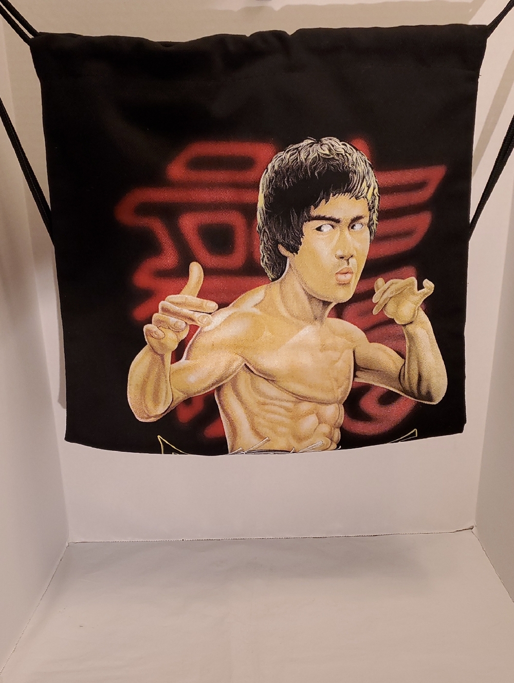 Bruce Lee Black Graphic Drawstring Backpack with Martial Arts Illustration
